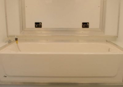 Pet bath in grooming trailer